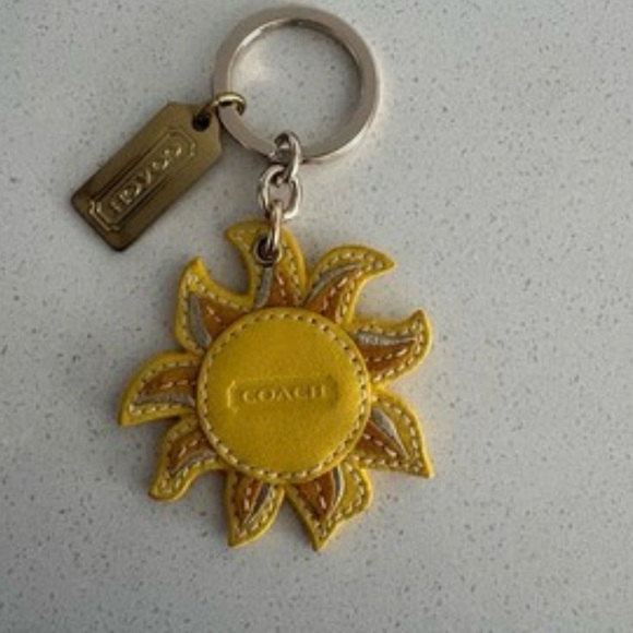 Coach Accessories - Coach Sunburst Yellow Keychain